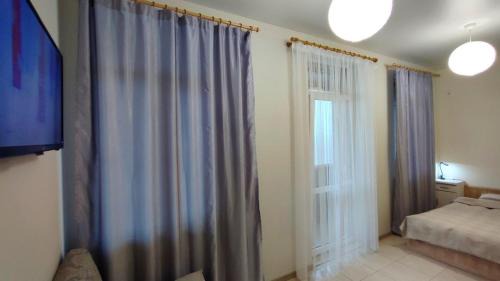 Petrovskoye Apartment | АПАРТАМЕНТЫ ЛЕВАДА Апартаменти ЛЕВАДА Apartments LEVADA