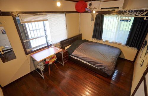 Nakasonecho Apartment | コザを楽しむ一軒家 Kaeruhouse