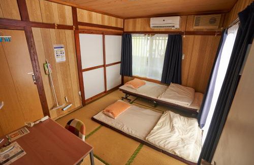 Nakasonecho Apartment | コザを楽しむ一軒家 Kaeruhouse