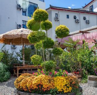 Gucheng Hotel | 丽江云栖意景智能花园客栈