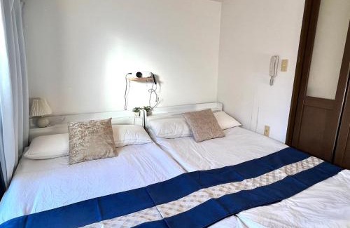 Naniwa Apartment | 大国町駅徒歩3分 なんば駅1駅 最大6名 ロイヤル603