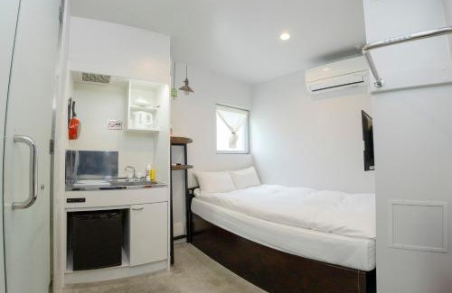 Taira Apartment | 小さなお部屋 フクギStyle