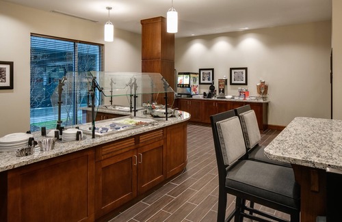 Historic East Village Condo | 1 Bedroom | Roll-in Shower, Indoor Pool + Hot Tub