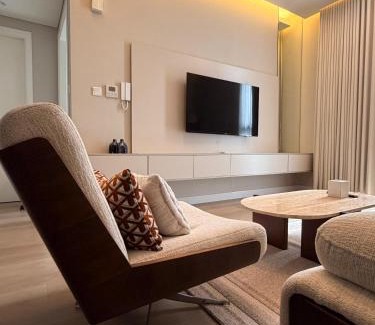 Sharjah Apartment | 1 BR Luxury Apt by AJ Aljada