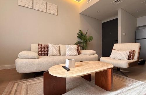 Sharjah Apartment | 1 BR Luxury Apt by AJ Aljada