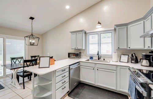 Lake Mills Condo | 1 Mi to Beach: Dog-Friendly Condo in Lake Mills!