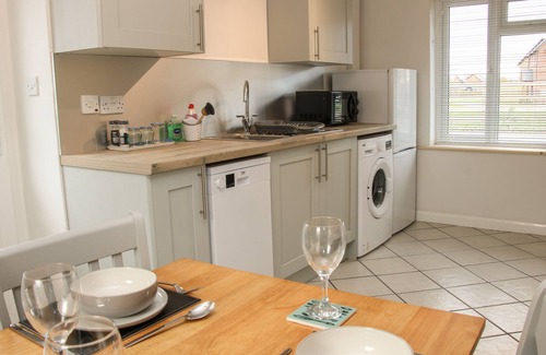 Four Crosses Cottage | 1 SARNWEN COTTAGES, pet friendly, with open fire in Four Crosses
