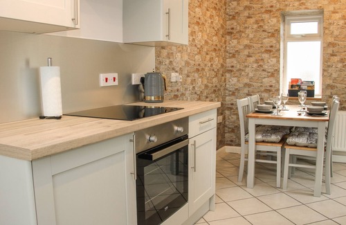 Four Crosses Cottage | 1 SARNWEN COTTAGES, pet friendly, with open fire in Four Crosses