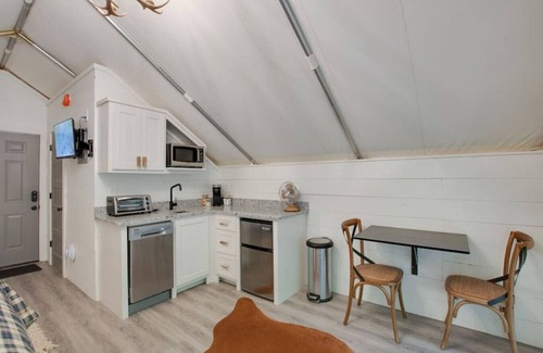 Groveoak RV Rental | #10 The Lodge Luxury Glamping Tent Hunting Theme