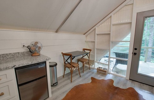 Groveoak RV Rental | #10 The Lodge Luxury Glamping Tent Hunting Theme