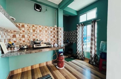 Jorhat House | 11th Nest ~ A Santorini home,1bhk with AC