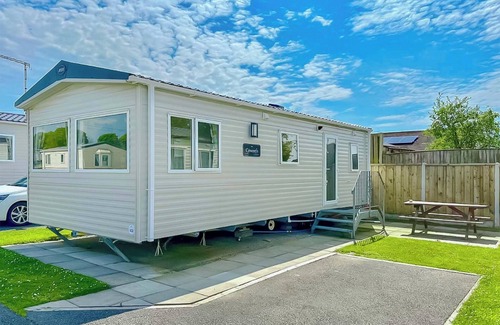 Cross Inn House | 12ft-wide caravan with one double and one twin.