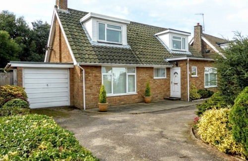 West Runton House | 14 Links Way - Only a stone’s throw away from the first tee at the Links Hotel Golf Course.