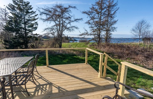 Lubec Cottage | 1840's oceanfront cottage full of modern updates and historic Maine charm.