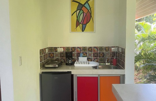 Puerto Viejo de Talamanca Cabin | 2 1 bedroom cabins with a pool 1 bathroom kitchen, living on a covered deck