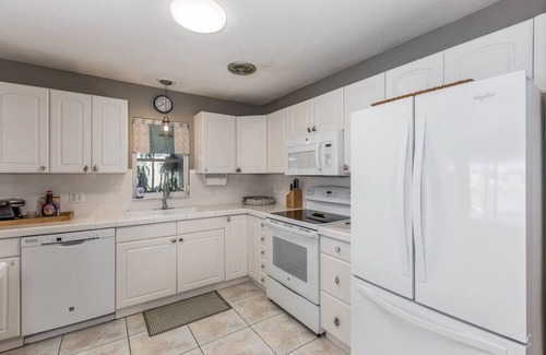 Flor-a-mar House | 2 BED 2 Bath HOME ON THE WATER - HEATED POOL ~ SUPs ~ KAYAKS ~ FISHING POLES!