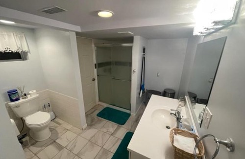 Round Lake Beach House | 2-Bedroom Basement Suite