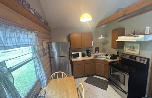 Duluth Cabin | 2-bedroom cabins in Duluth with WiFi access at the bar and restaurant building.