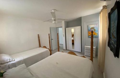 Cofresi Villa | 2 BR & 1WR Suite at Villa Costa Verde near Playa Cofresi, Puerto Plata with a pool, balcony, and a rooftop terrace