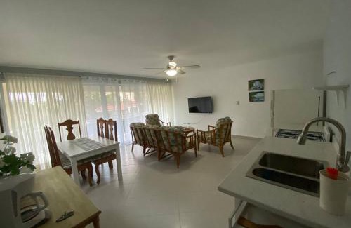 Cofresi Villa | 2 BR & 1WR Suite at Villa Costa Verde near Playa Cofresi, Puerto Plata with a pool, balcony, and a rooftop terrace