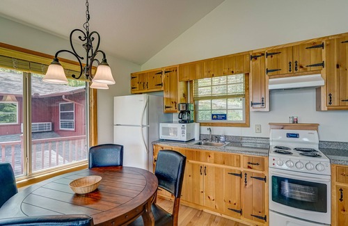 Cedar Cliff House | 2 lakefront cabins with lake & mountain views, private dock