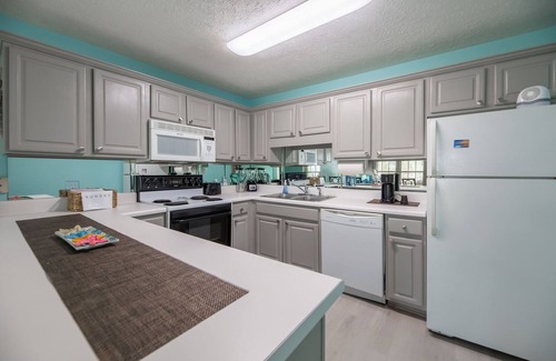 West Panama City Beach Condo | 2 min toes hit sand ❤ Deck dining. MiniGolf+4pools