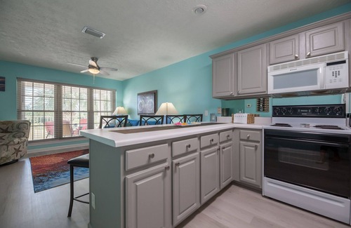 West Panama City Beach Condo | 2 min toes hit sand ❤ Deck dining. MiniGolf+4pools