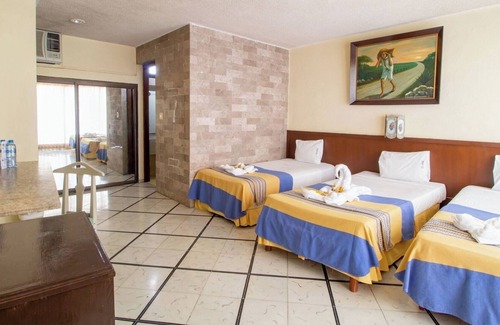 Merida Municipality Hotel | 2 Triple Rooms at Mérida, Perfect for Families & Poolside Relaxation