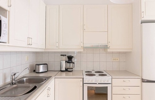 Rovaniemi Apartment | 2BDR City Apt with Private Sauna by BookLapland