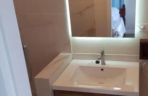 Buccoo Apartment | 2BR 2BTH Apt w patio & garden 3 mins walk to beach boardwalk shops & restaurants