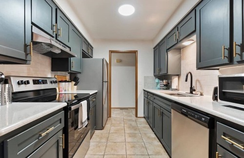 Wichita House | 3 Bed 2 Bath Home w/2 Car Garage & Fitness Room