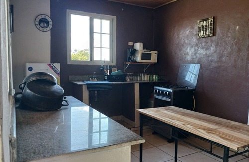 El Palmar House | 3 bedroom, 1 bath home with pool access, 10 minutes from the beach.