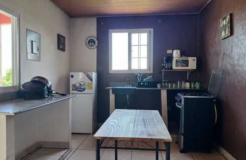 El Palmar House | 3 bedroom, 1 bath home with pool access, 10 minutes from the beach.