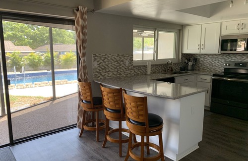 Hammocks Of Palm Harbor House | 3-bedroom vacation home just 10 minutes from Honeymoon Island - Heated Pool