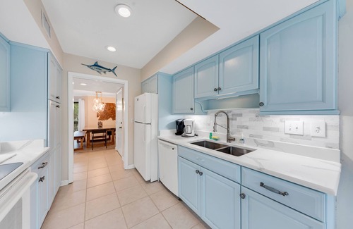 Spinnaker Beachhouses House | 3BR/2BA Spinnaker! Golf/Lagoon Views! Walk to Pelican Beach, Club, Pools! Amenity Cards!