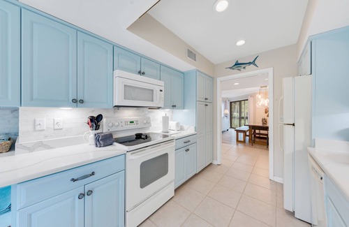 Spinnaker Beachhouses House | 3BR/2BA Spinnaker! Golf/Lagoon Views! Walk to Pelican Beach, Club, Pools! Amenity Cards!