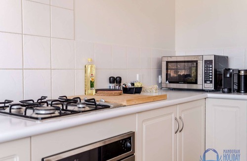 Wannanup Villa | 3BR townhouse in secure canal complex with double garage, walk