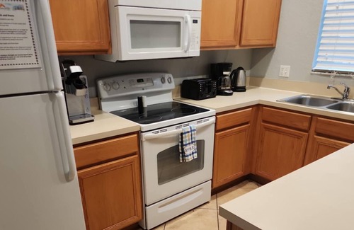 Regal Palms House | 4 bedroom townhouse. Located steps from the pool. 5% discount for week bookings.