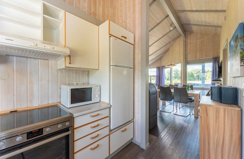 Norderteil House | 4-person vacation home with wood-burning stove, canoe and wonderful lake view in Otterndorf