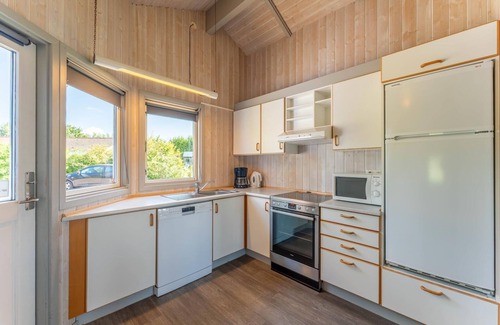 Norderteil House | 4-person vacation home with wood-burning stove, canoe and wonderful lake view in Otterndorf