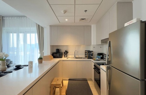 Abu Dhabi Apartment | 4BR Apt Water's Edge: Cozy Comfort & Modern Design
