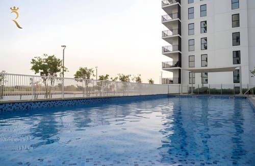 Abu Dhabi Apartment | 4BR Apt Water's Edge: Cozy Comfort & Modern Design