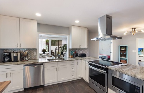 West Bradenton House | 4BR Saltwater Pool Oasis, Game Room, Outdoor Spa, & Tropical Garden Retreat