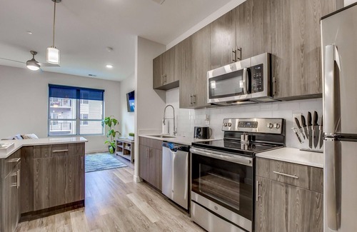 Downtown Louisville Apartment | 4th Street Suites - Deluxe King Bed Suite w/ Pool ❤ FREE PARKING