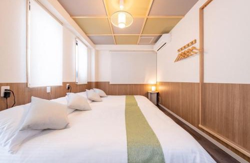 Higashishinsaibashi Apartment | 5階 ホテル鶴 道頓堀に位置する宿 ベッド9台 シャワー2台 観光に最適