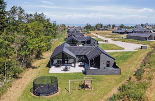 Hasmark Strand House | 5 star holiday home in Otterup
