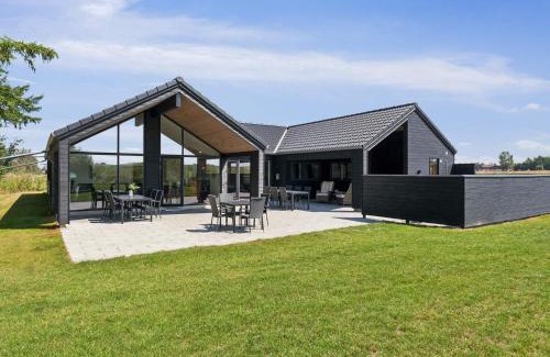 Hasmark Strand House | 5 star holiday home in Otterup