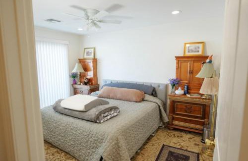 Paradise House | 7 bedroom home with fenced yard