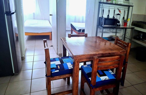 Acapulco Apartment | 8 minutes from the beach! Family apartment with pool & gardens in private gated community