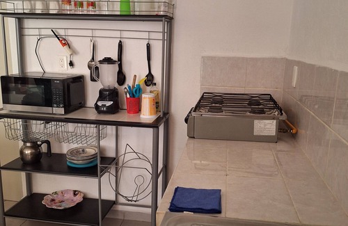 Acapulco Apartment | 8 minutes from the beach! Family apartment with pool & gardens in private gated community